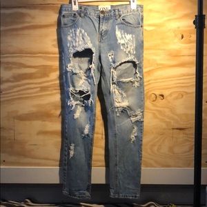 Ripped blue jean size 24